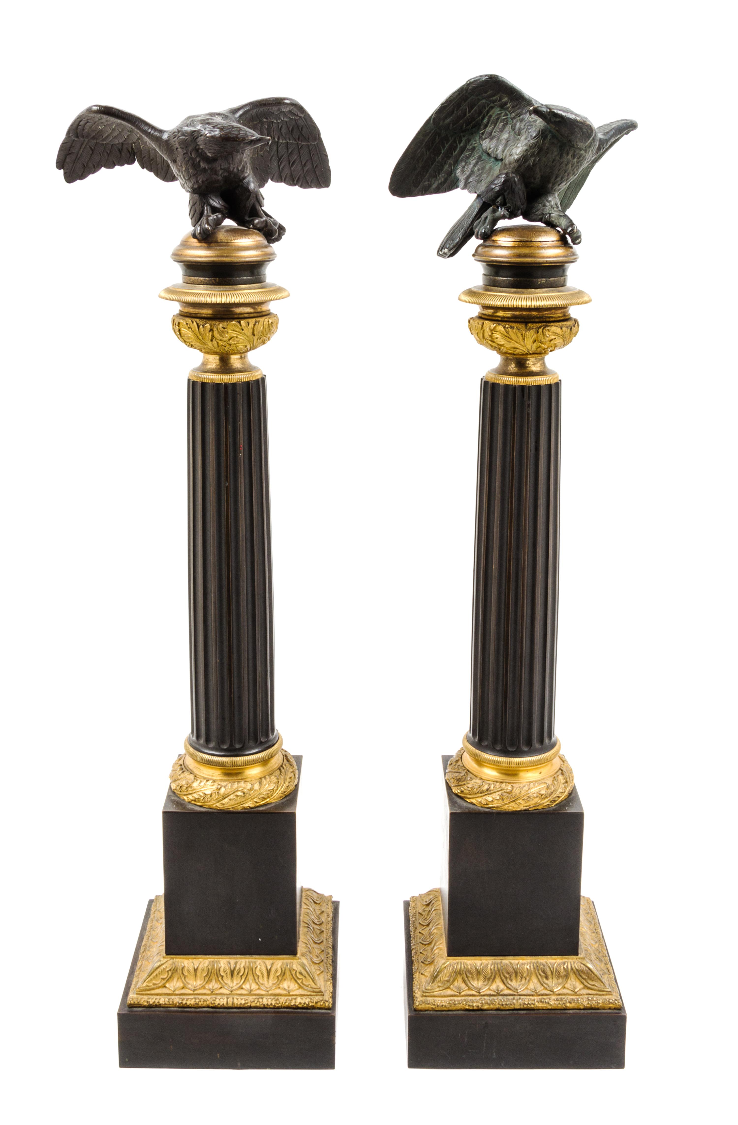 A Pair of Empire Gilt and Patinated Bronze Ornaments Height 25 1/2 inches. — 19TH CENTURY