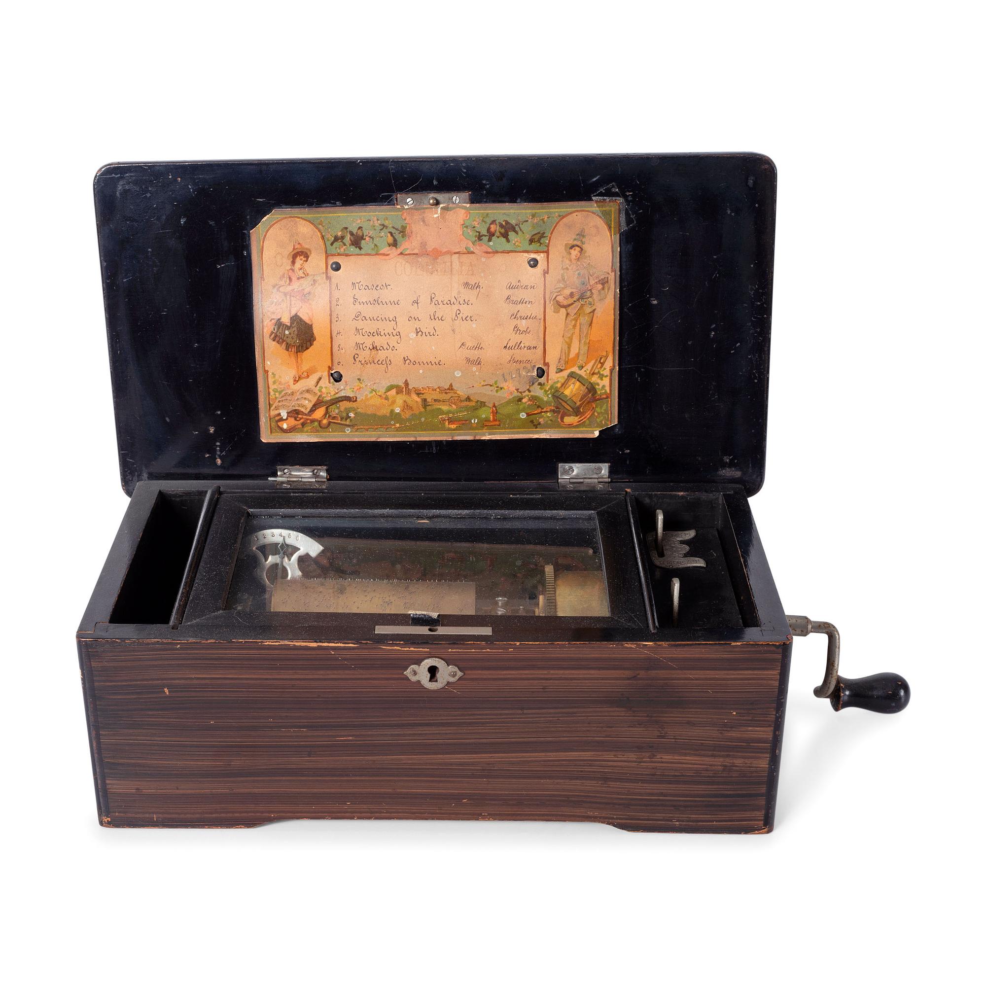 A Six Tune Cylinder Swiss Music Box with Rosewood Case