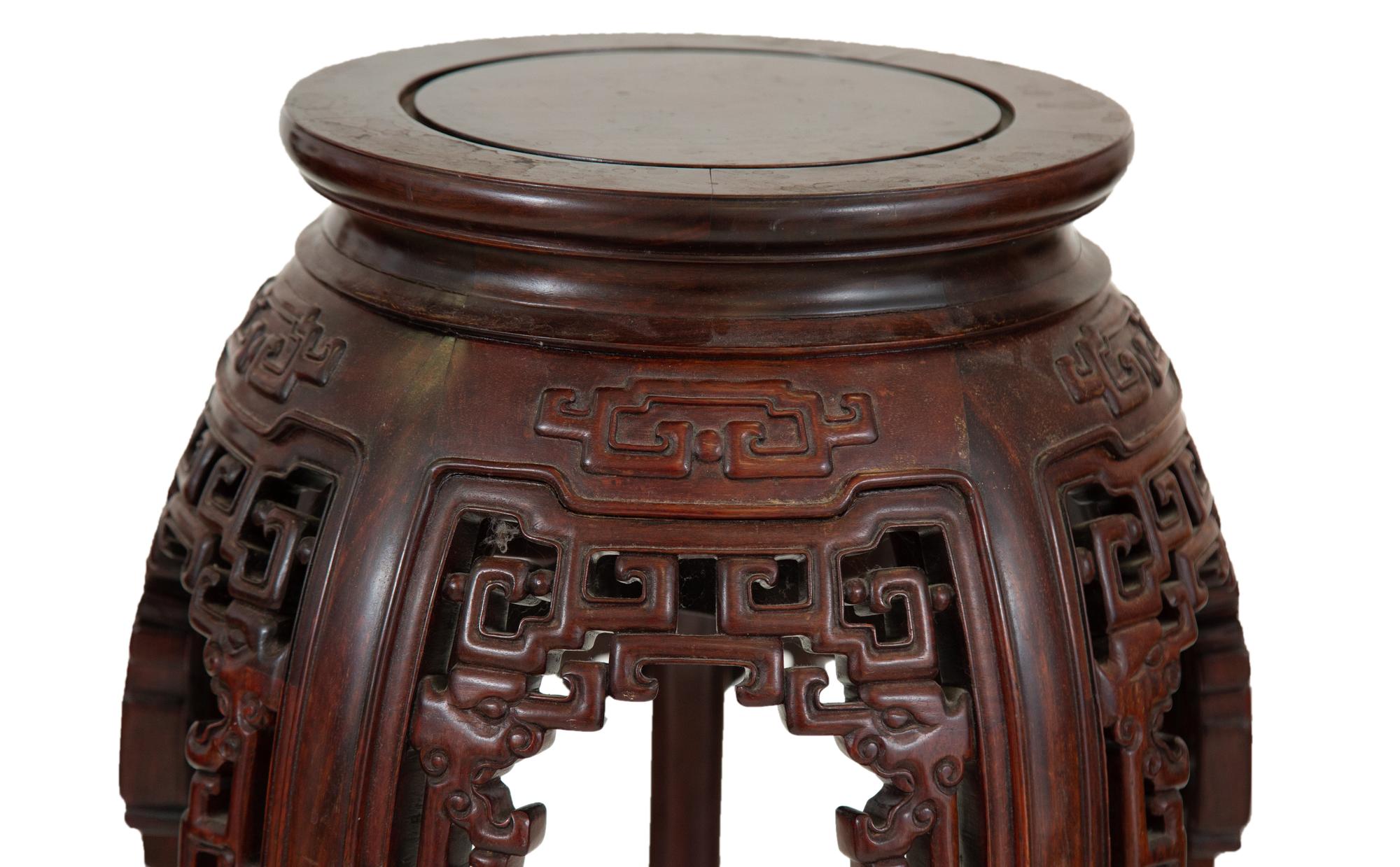 A Chinese Carved Rosewood Jardinière Stand