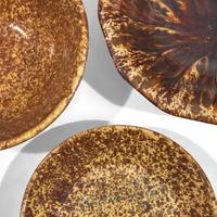 A Large Group of Twenty-Seven Bennington or Rockingham Glazed Earthenware Items