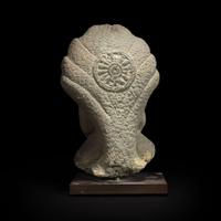 A Khmer style carved stone figure of Buddha seated under a cobra canopy 高棉风格石雕眼镜蛇冠冕佛首