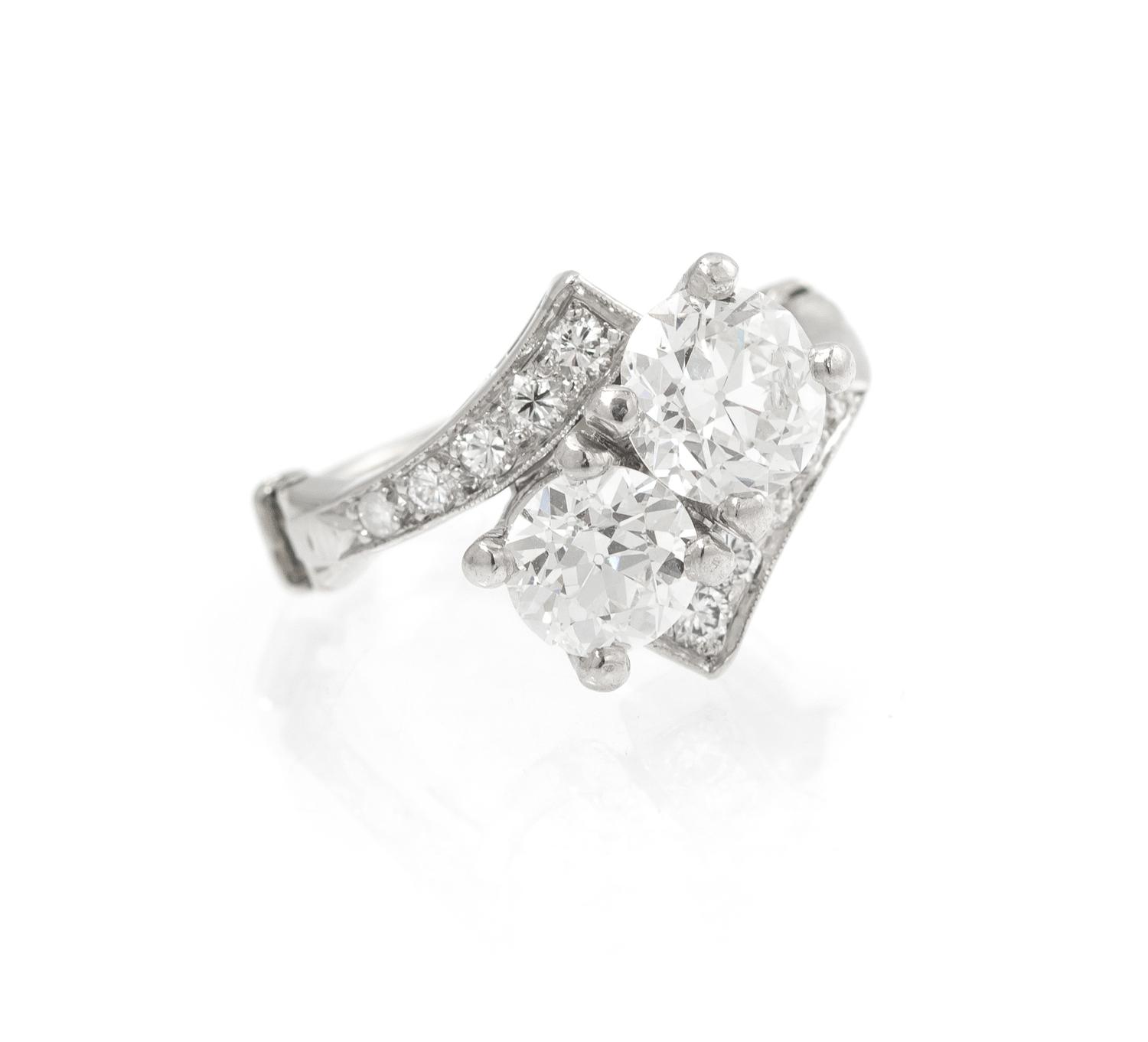 A Platinum, White Gold and Diamond Ring, 4.20 dwts.