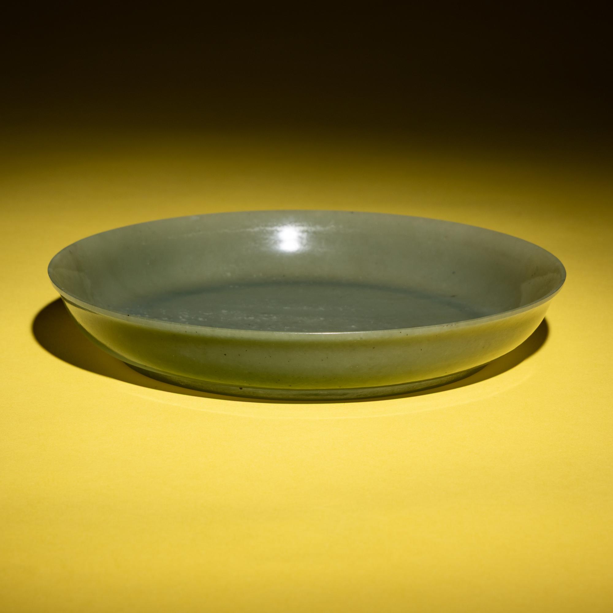 A Chinese Celadon Jade Dish, 19th Century — 清晚期 青玉盤