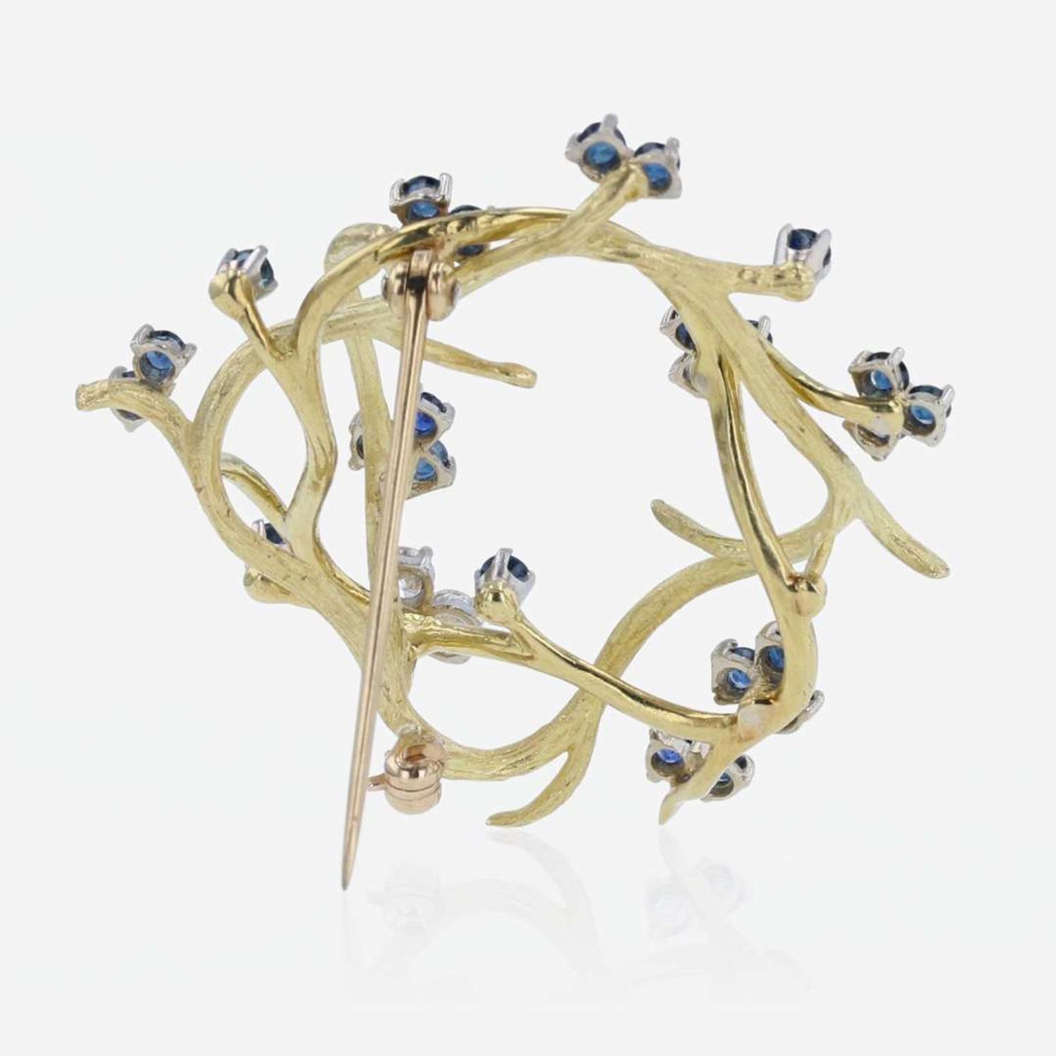 A 14K Yellow Gold, Diamond, and Sapphire Brooch