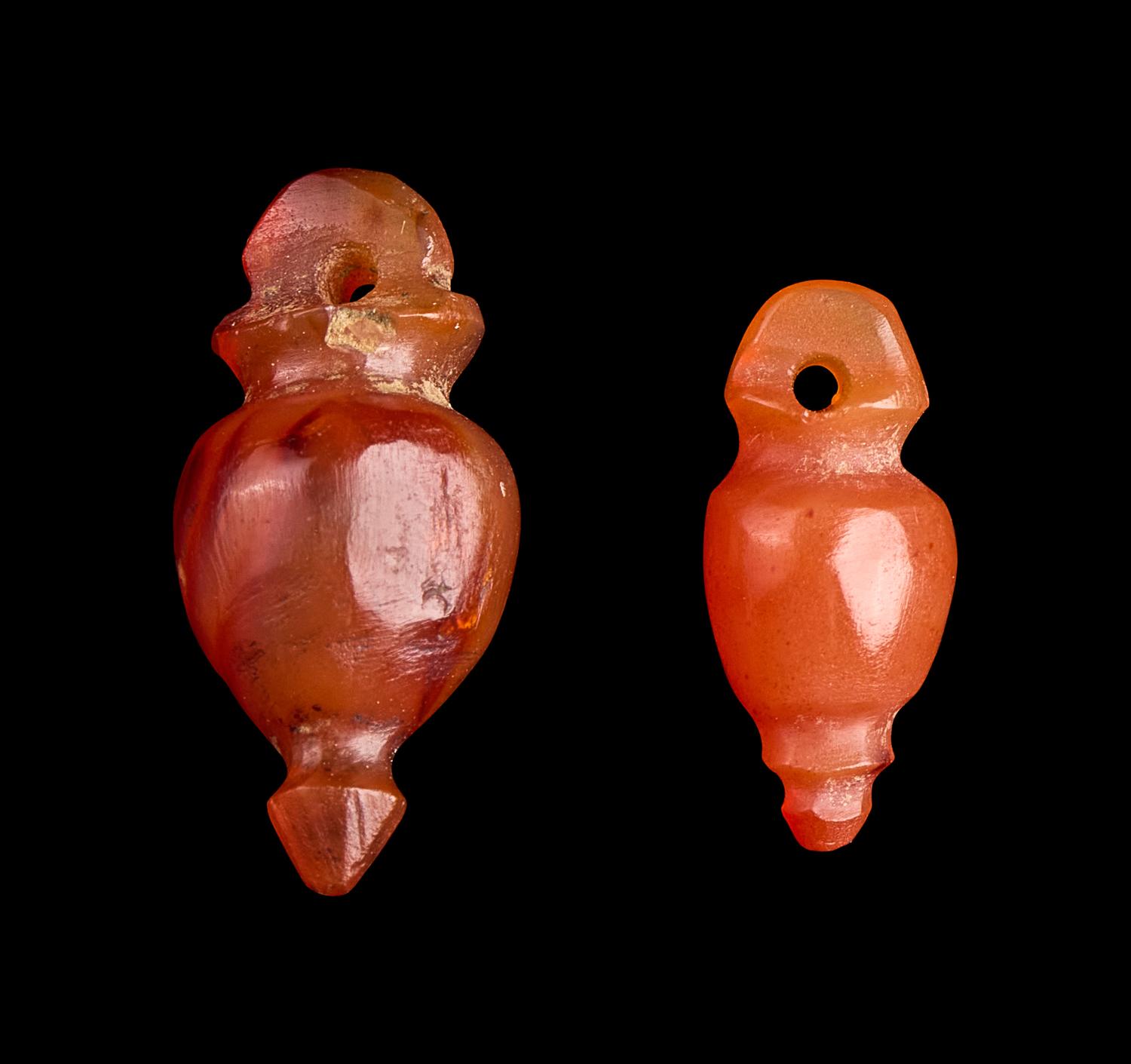A Pair of Egyptian Carnelian Heart Amulets