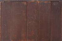A Continental Walnut Serpentine-Front Chest of Drawers