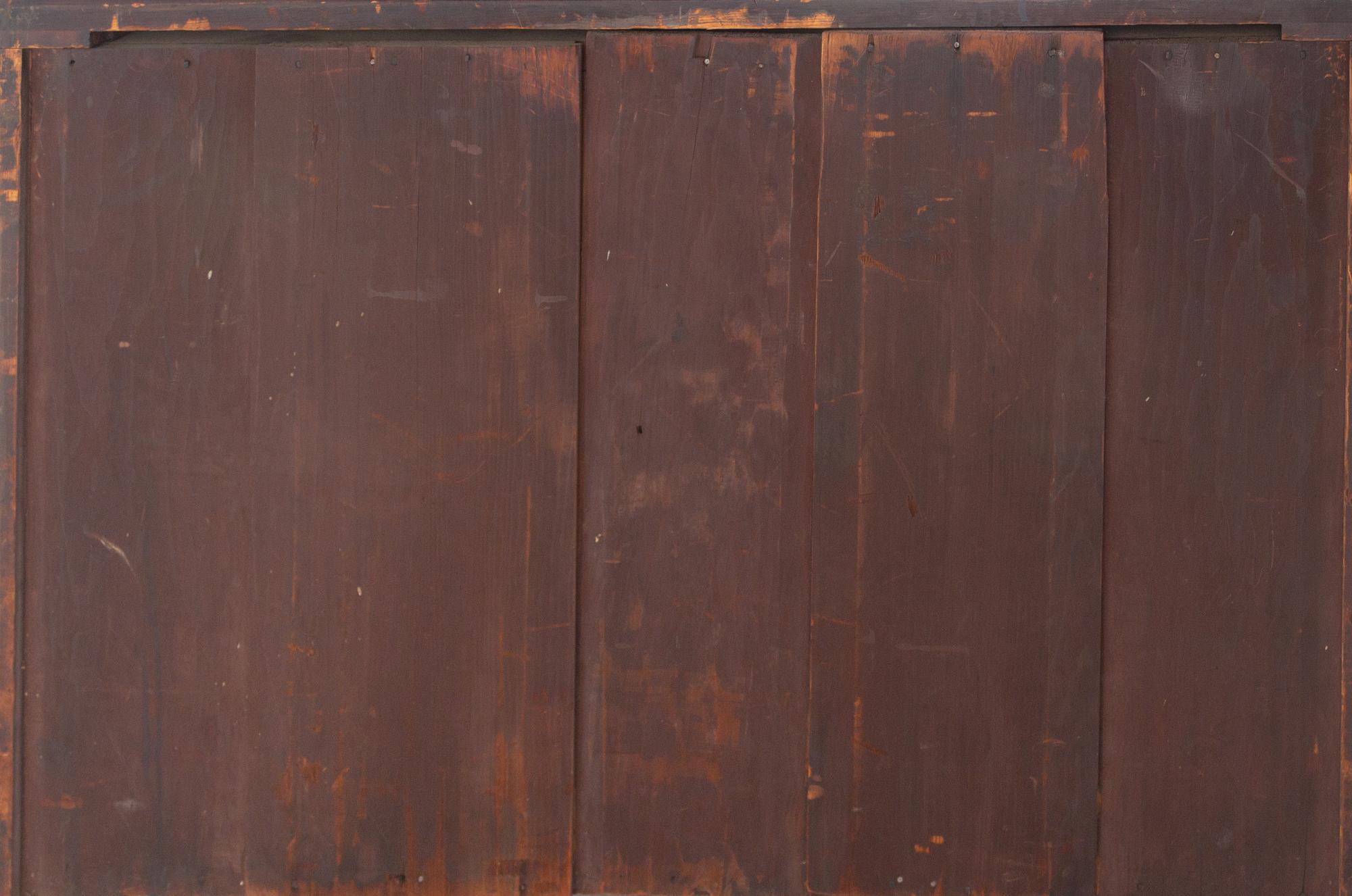 A Continental Walnut Serpentine-Front Chest of Drawers