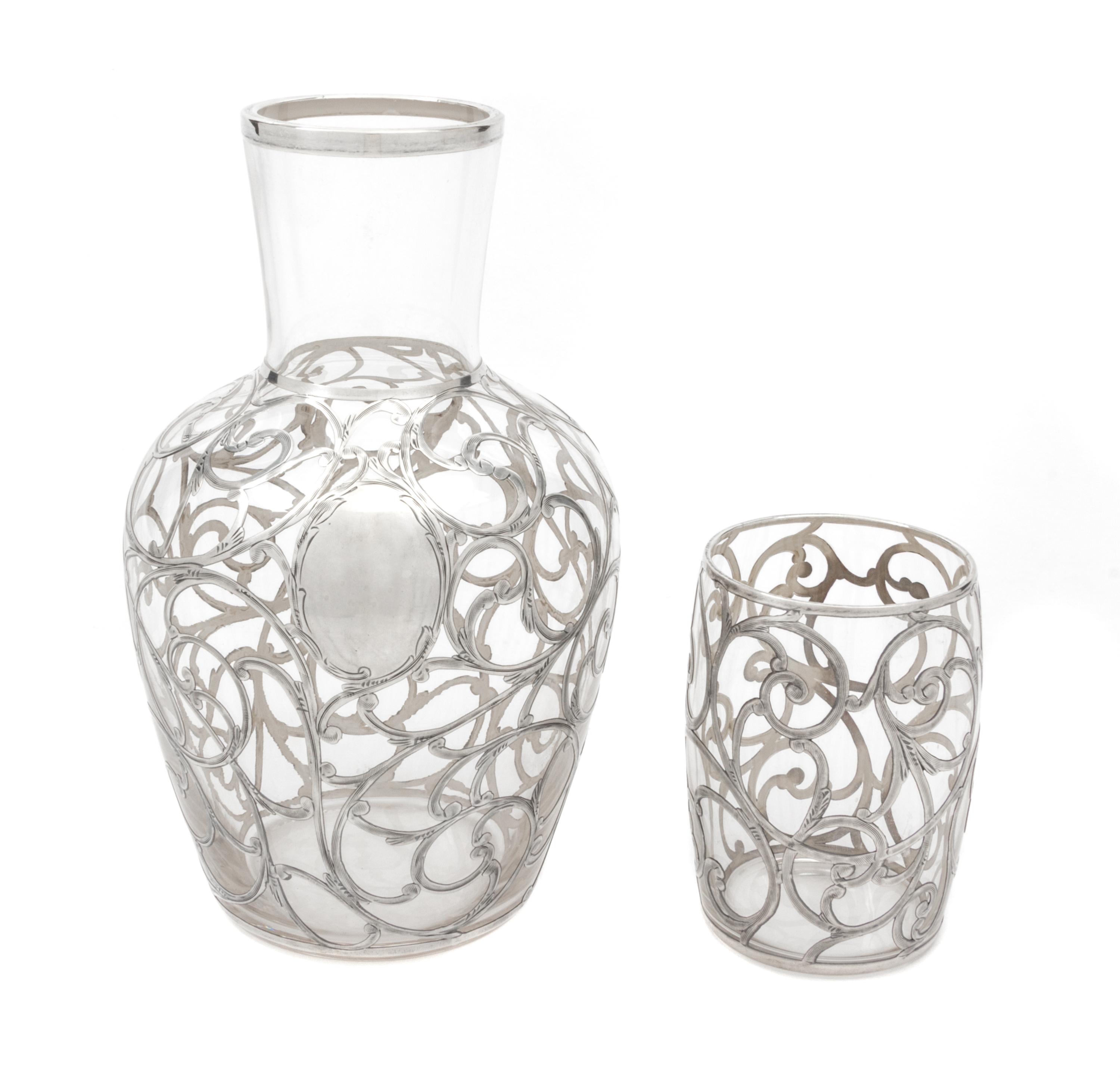 A Silver Overlay Glass Tumble Up Height of tallest 17 inches.