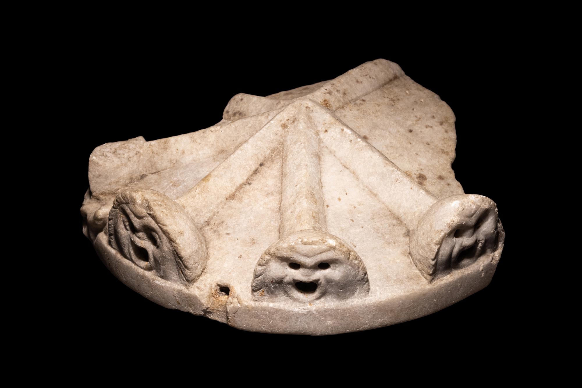A Roman Marble Cinerarium Fragment