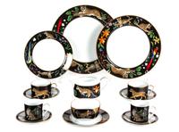 A Lynn Chase Porcelain Dinner Service Diameter of largest 13 inches.