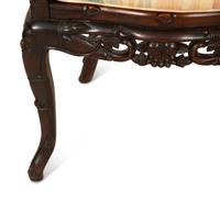 A Pair of Chinese Hongmu Horseshoe Back Carved Armchairs