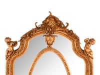 A Pair of Régence Style Gilt Composition Mirrors