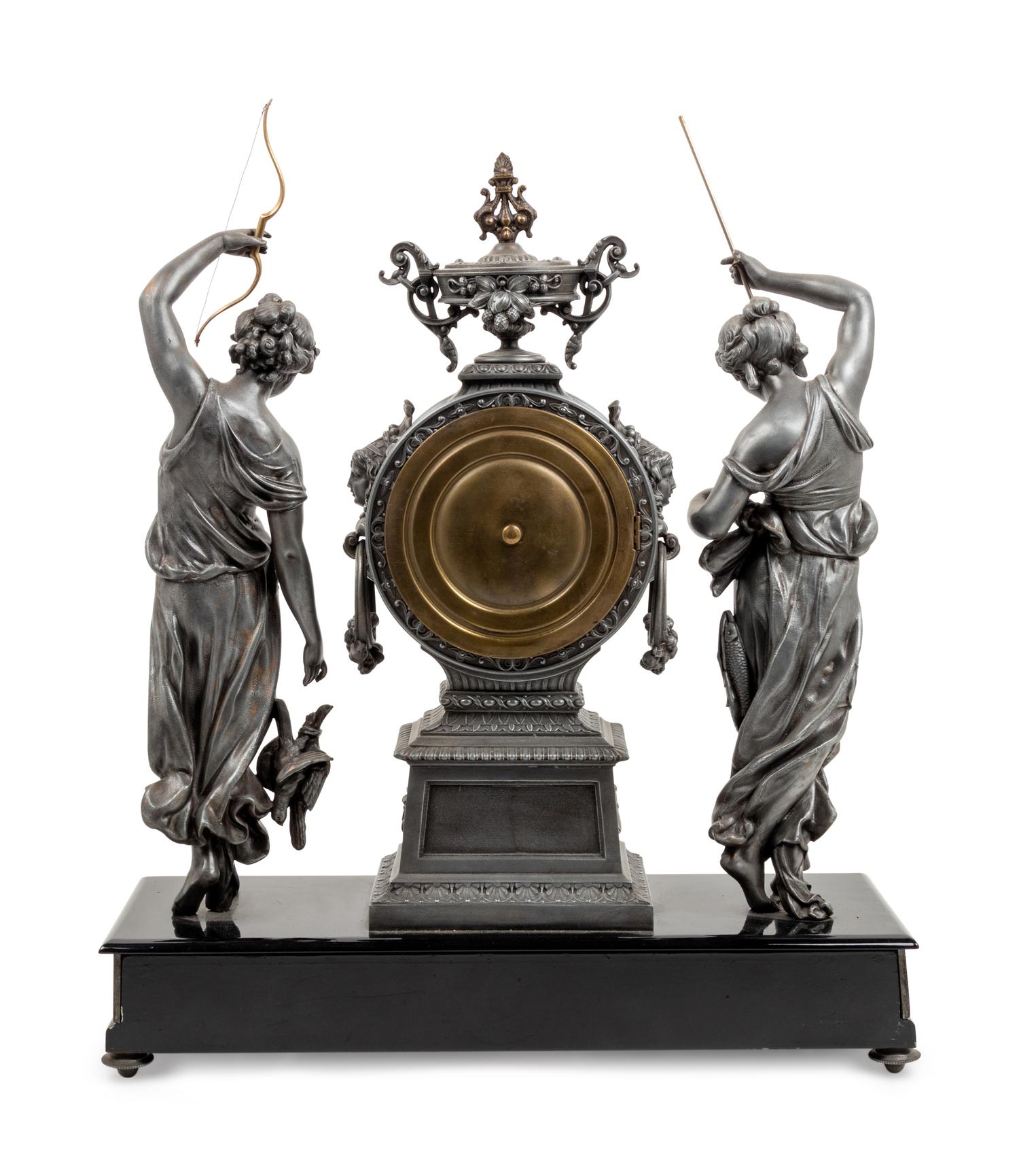 An Ansonia Fisher & Hunter Silvered Metal Mantel Clock