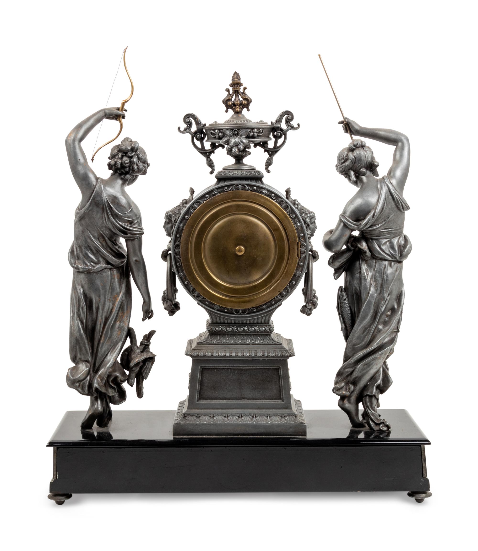 An Ansonia Fisher & Hunter Silvered Metal Mantel Clock
