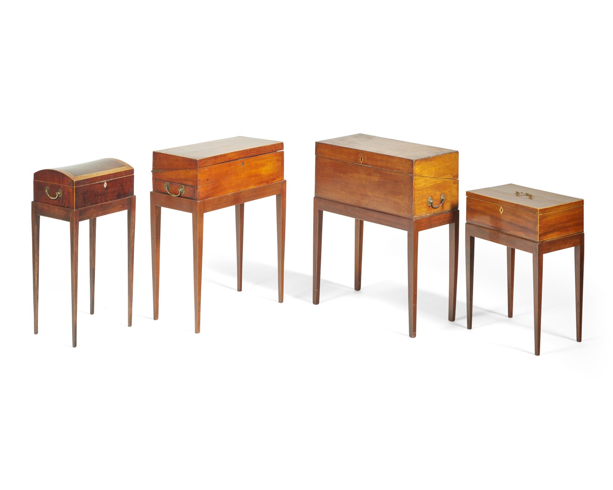 A group of four George III inlaid mahogany writing and document boxes on later stands, late 18th / early 19th century and later