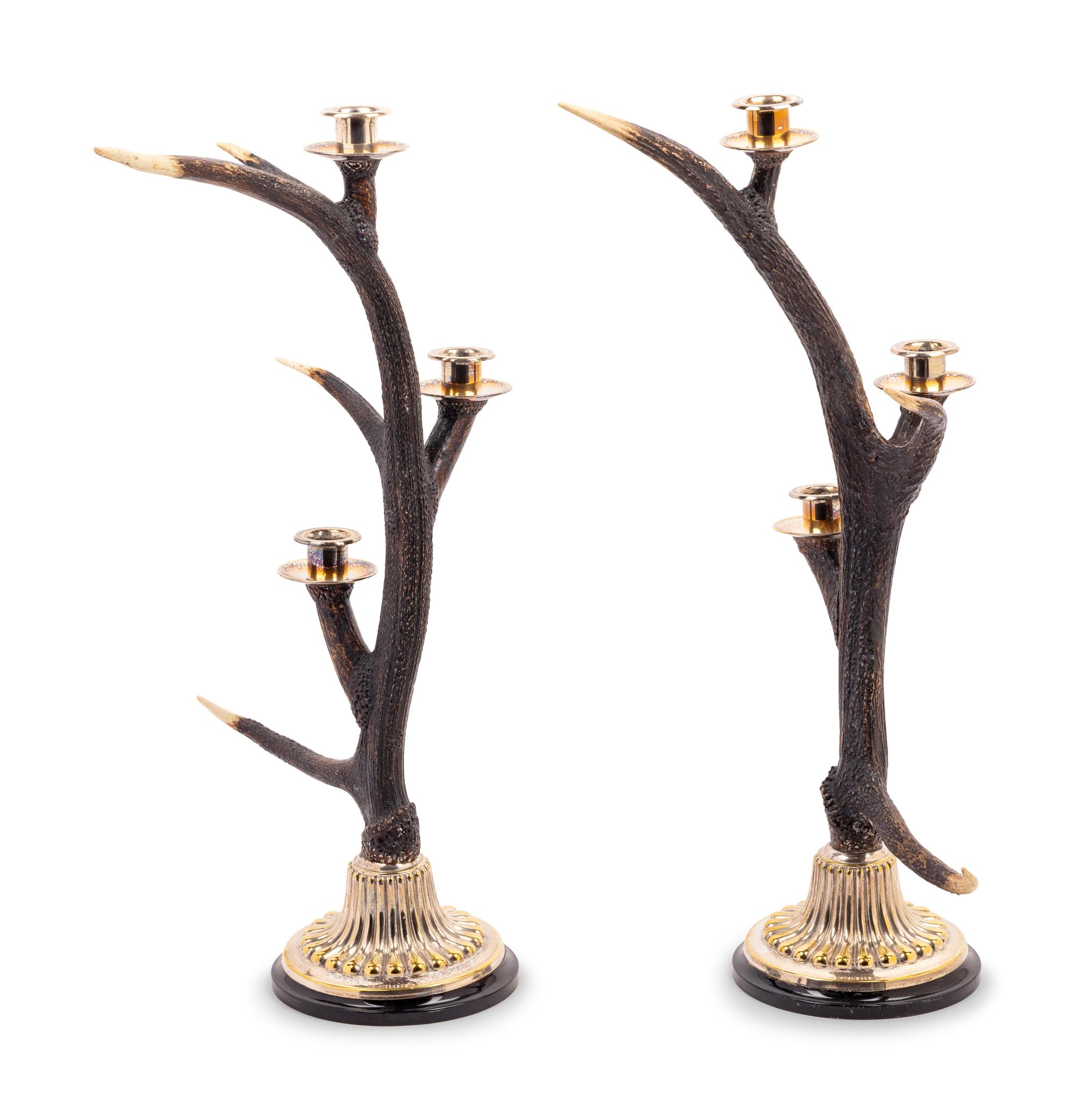 A Pair of Silvered Metal Mounted Antler Three-Light Candelabra