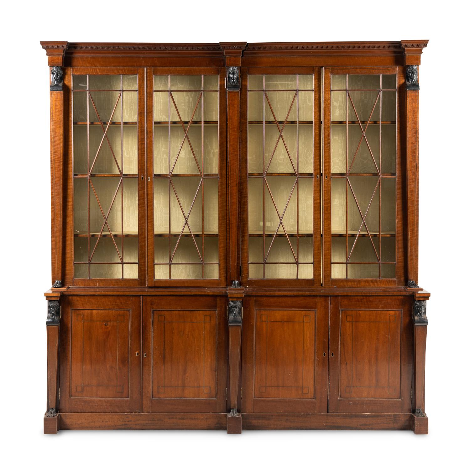 A Regency Part Ebonized Mahogany Breakfront Bookcase