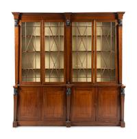 A Regency Part Ebonized Mahogany Breakfront Bookcase
