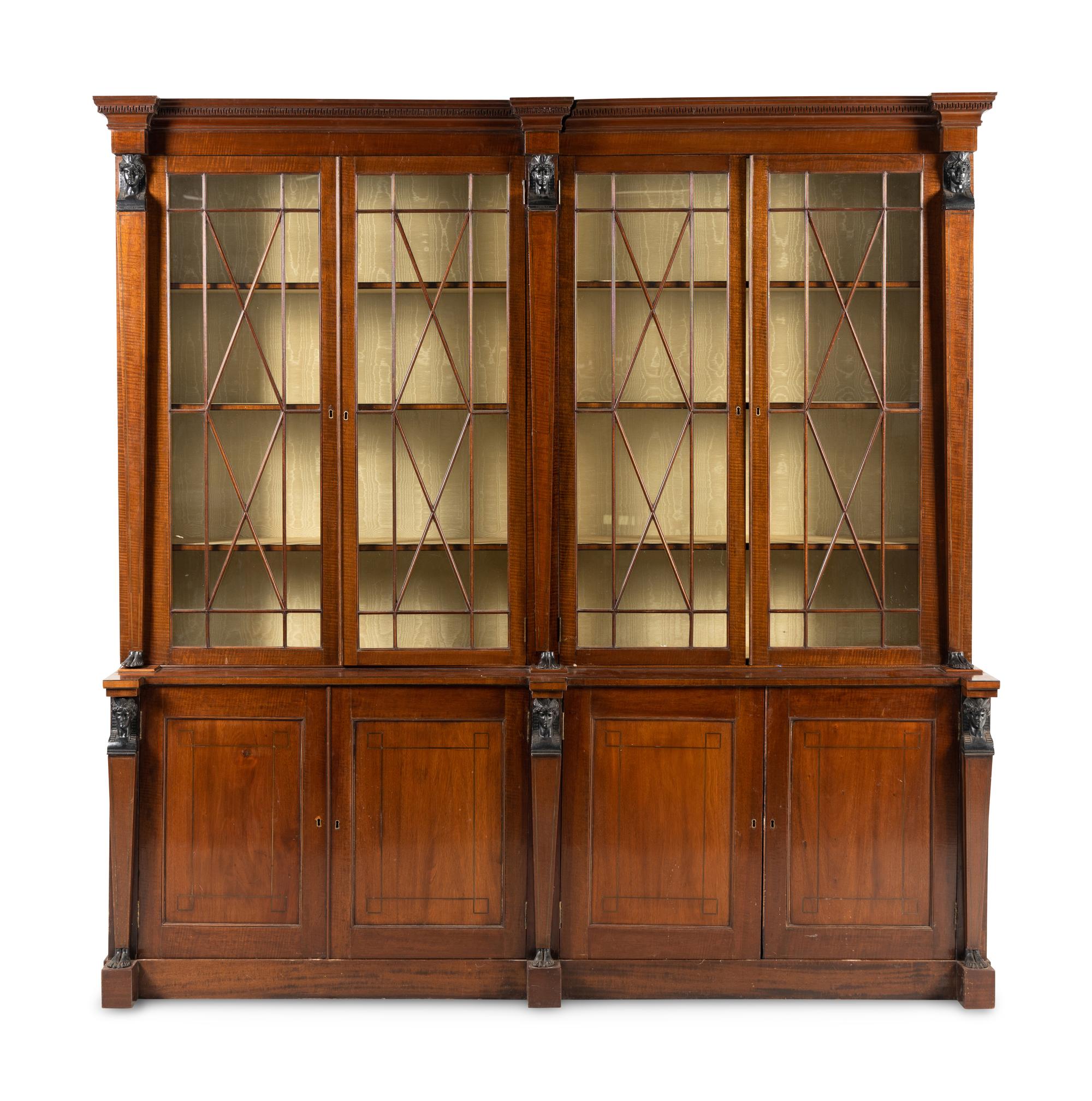 A Regency Part Ebonized Mahogany Breakfront Bookcase