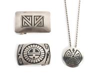 Two Hopi Silver Overlay Belt Buckles Height of largest 1 1/2 x width 2 1/8 inches