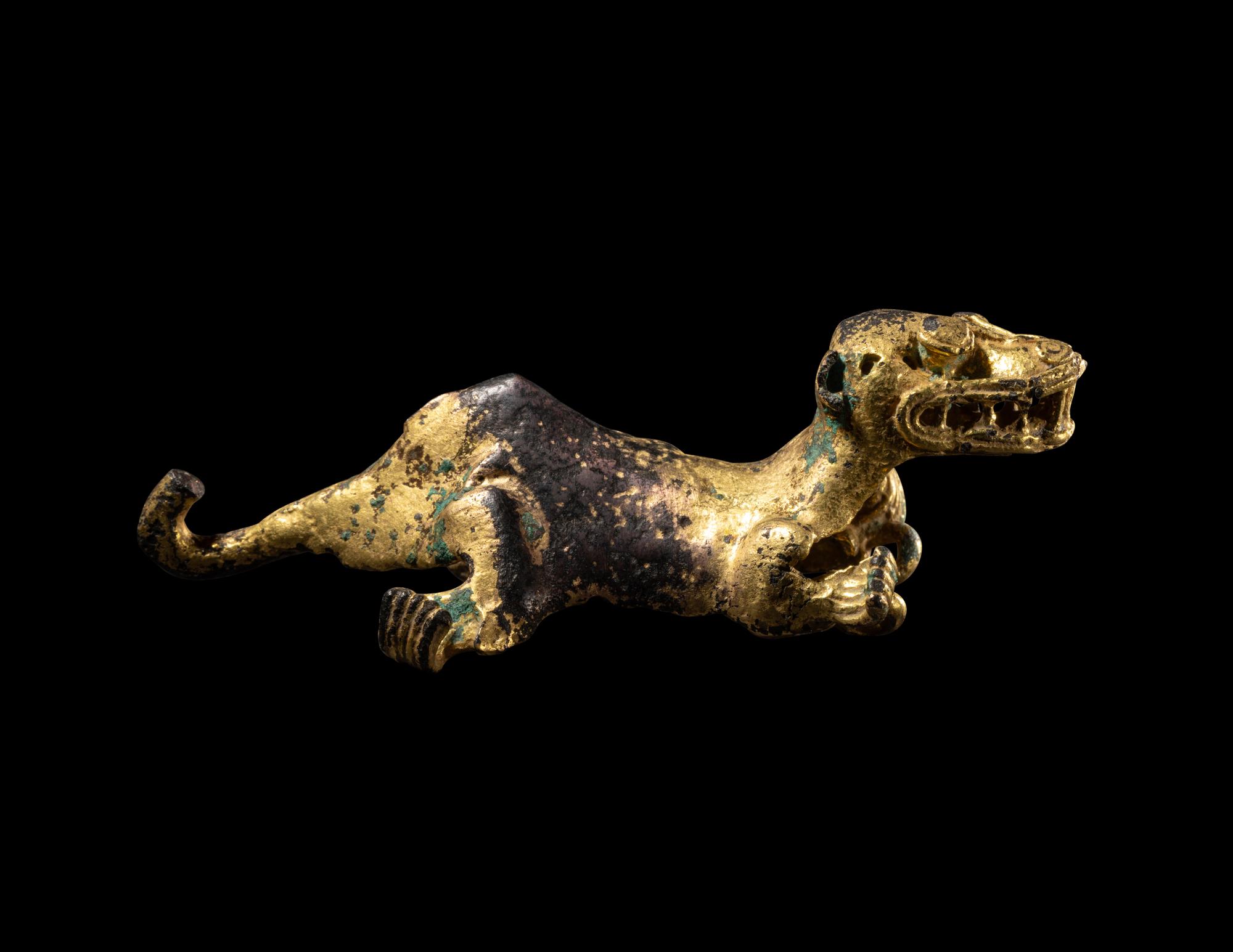 A Diquis Gold-Plated Feline Pendant