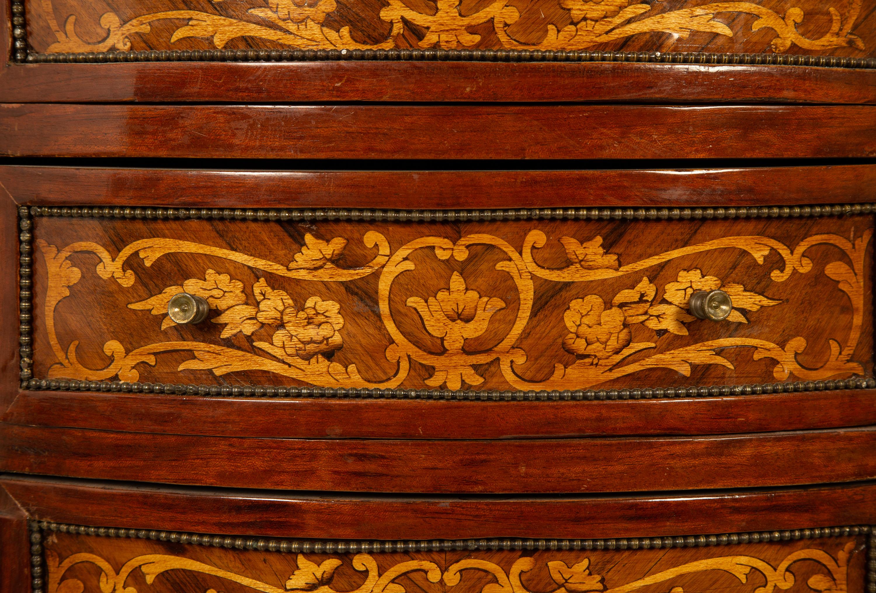 A Louis XVI Style Gilt Metal Mounted Marquetry Semainier