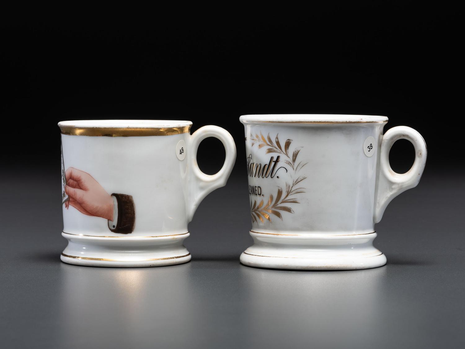 Two Porcelain Occupational Shaving Mugs