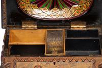 A Carved and Painted Wood Valuables Box with Masonic Interest