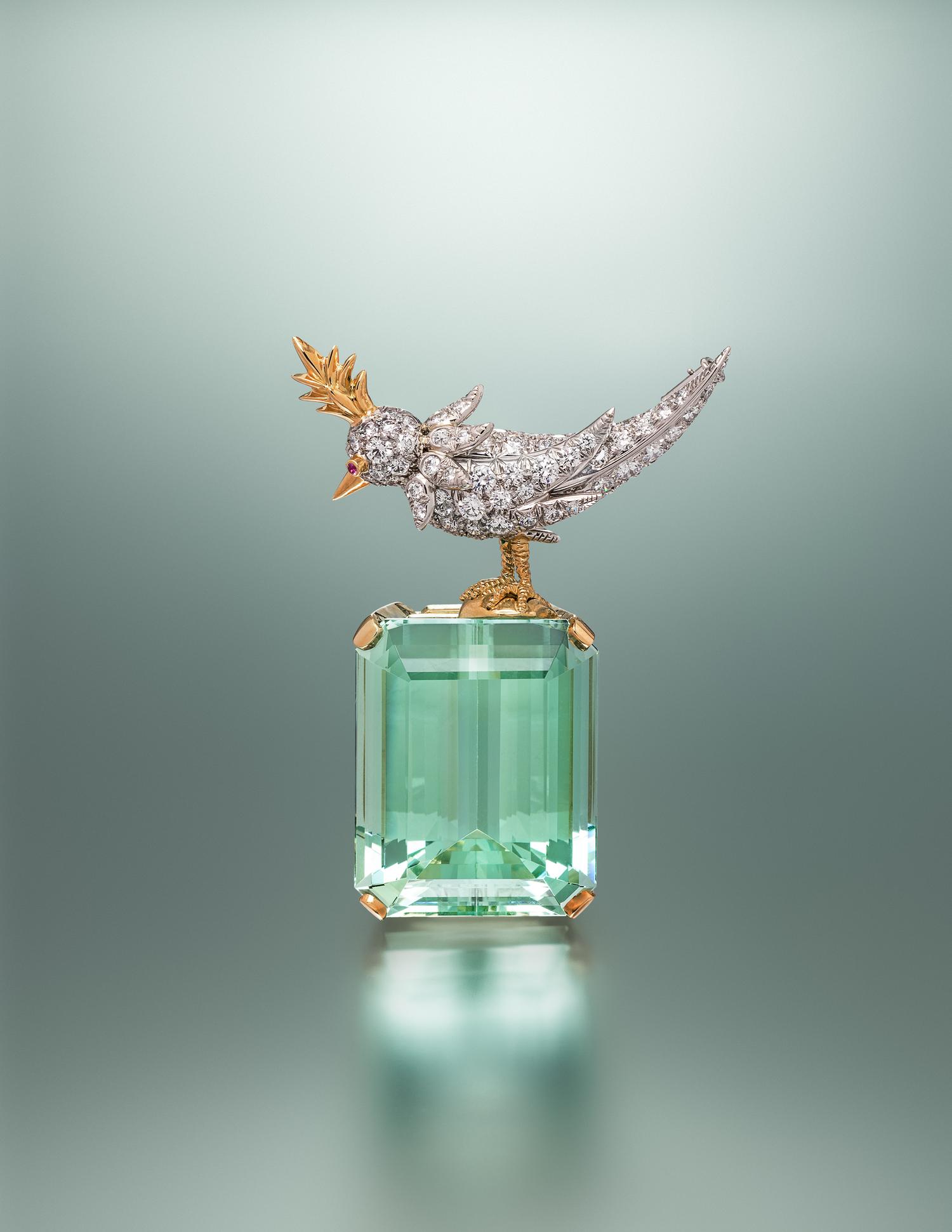 TIFFANY & CO., SCHLUMBERGER, GREEN BERYL AND DIAMOND 'BIRD ON A ROCK' BROOCH