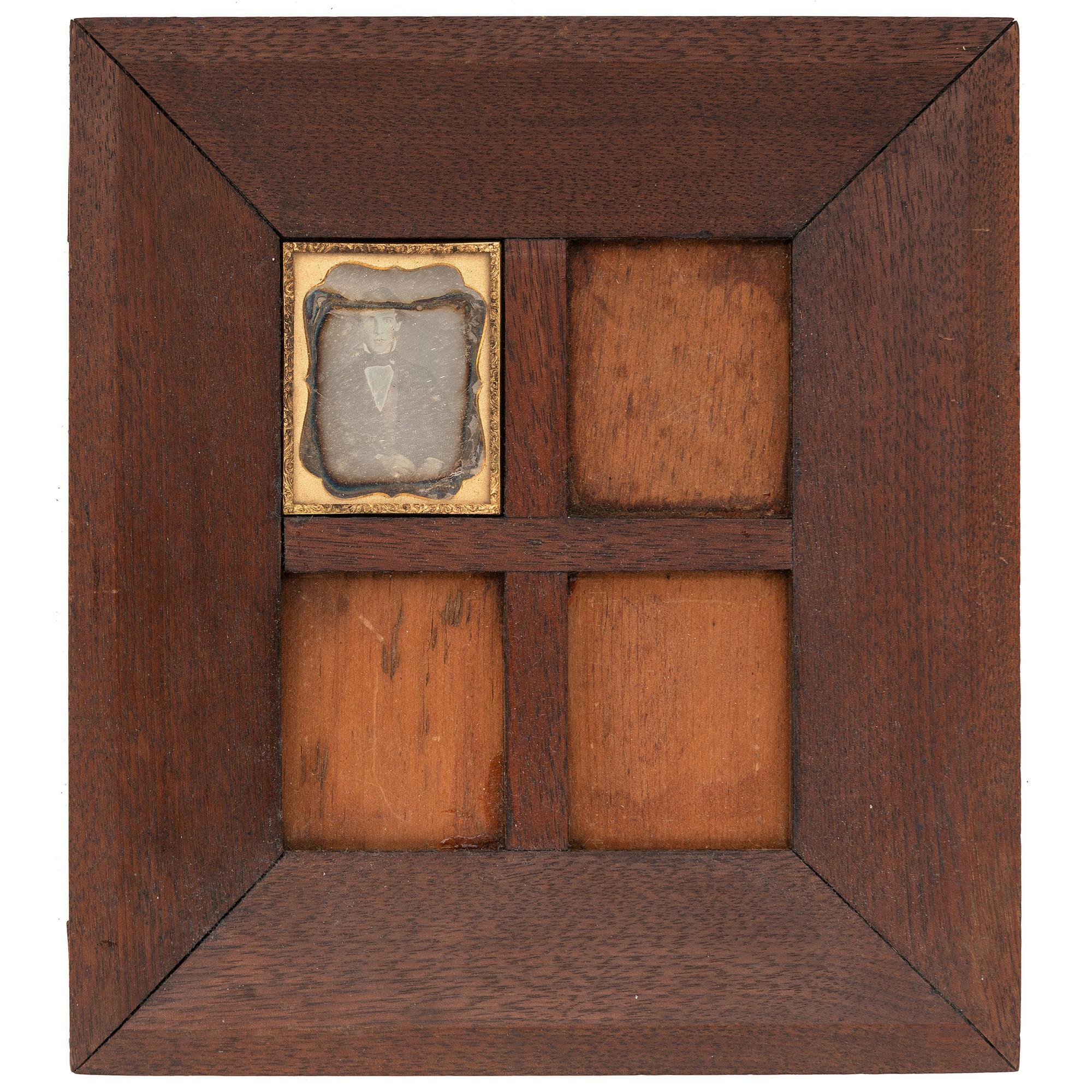 [EARLY PHOTOGRAPHY - PORTRAITURE]. A Daguerreian wall frame containing 6 quarter plate tintypes, with additional frames and mats, including: