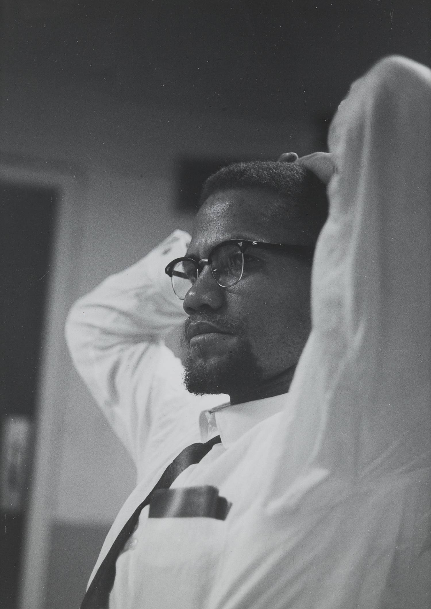 [MALCOLM X (1925-1965)]. SCHATT, Roy (1919-2002). Gelatin silver print. 1964.