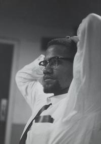 [MALCOLM X (1925-1965)]. SCHATT, Roy (1919-2002). Gelatin silver print. 1964.