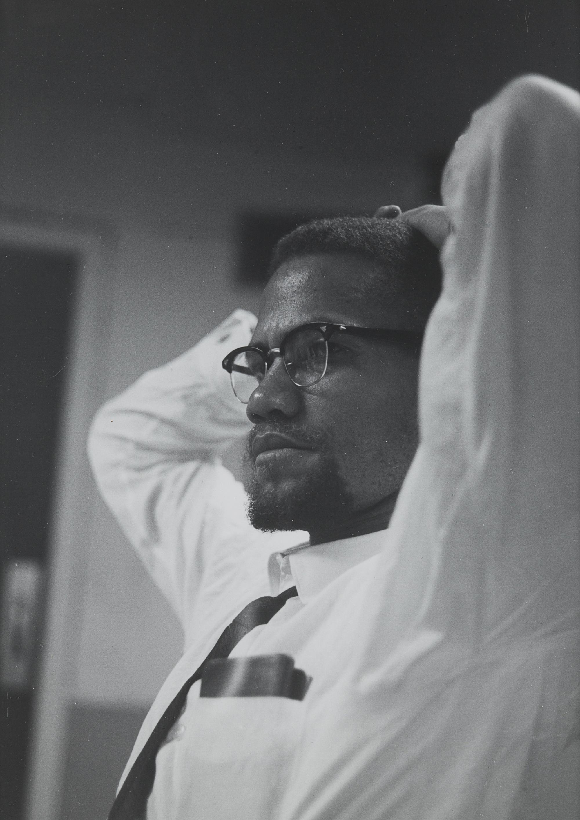[MALCOLM X (1925-1965)]. SCHATT, Roy (1919-2002). Gelatin silver print. 1964.