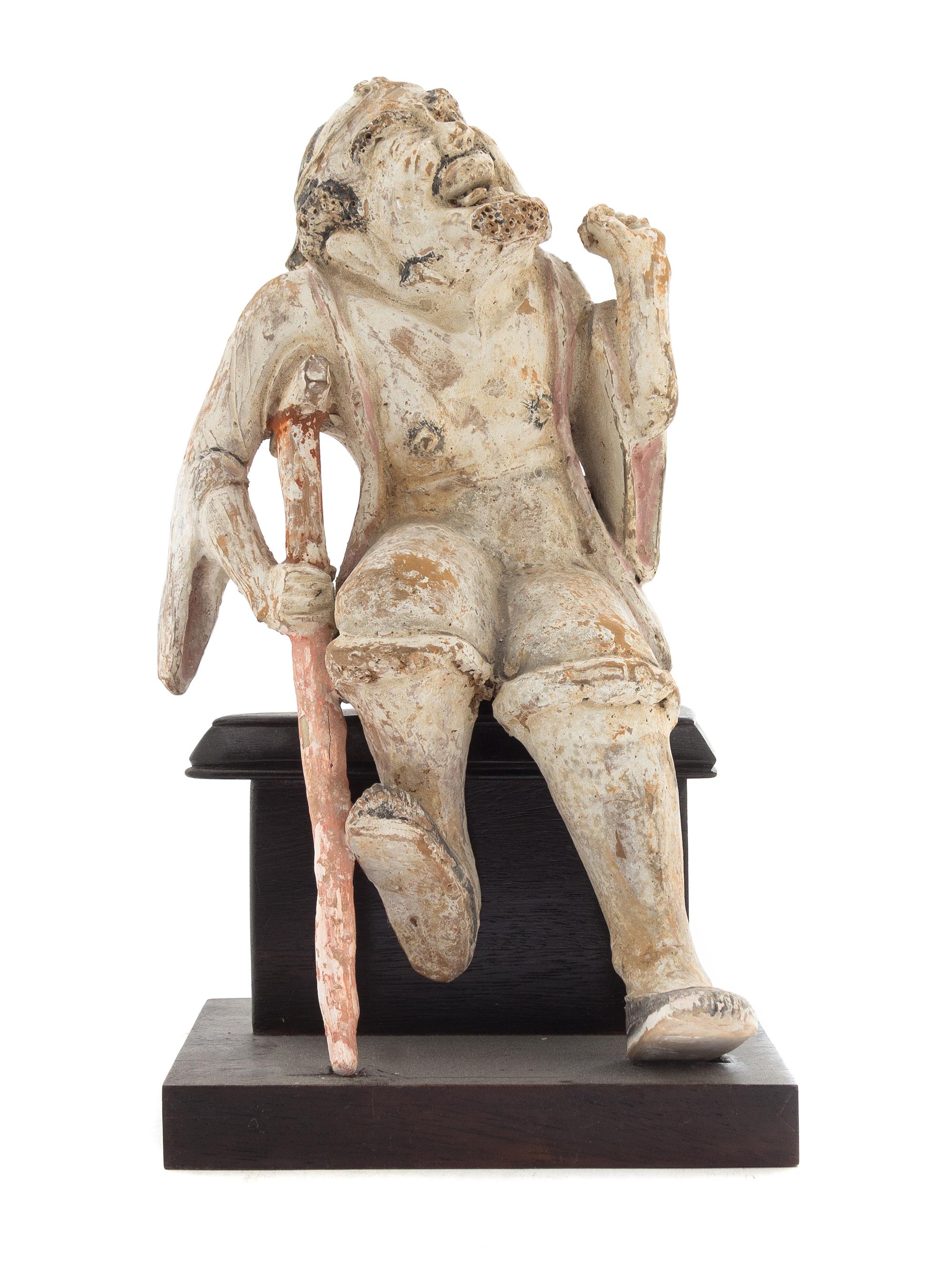 A Polychrome Glazed Pottery Figure of an Immortal Height 10 1/2 inches.