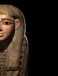 An Egyptian Polychrome Wood Mummy Mask