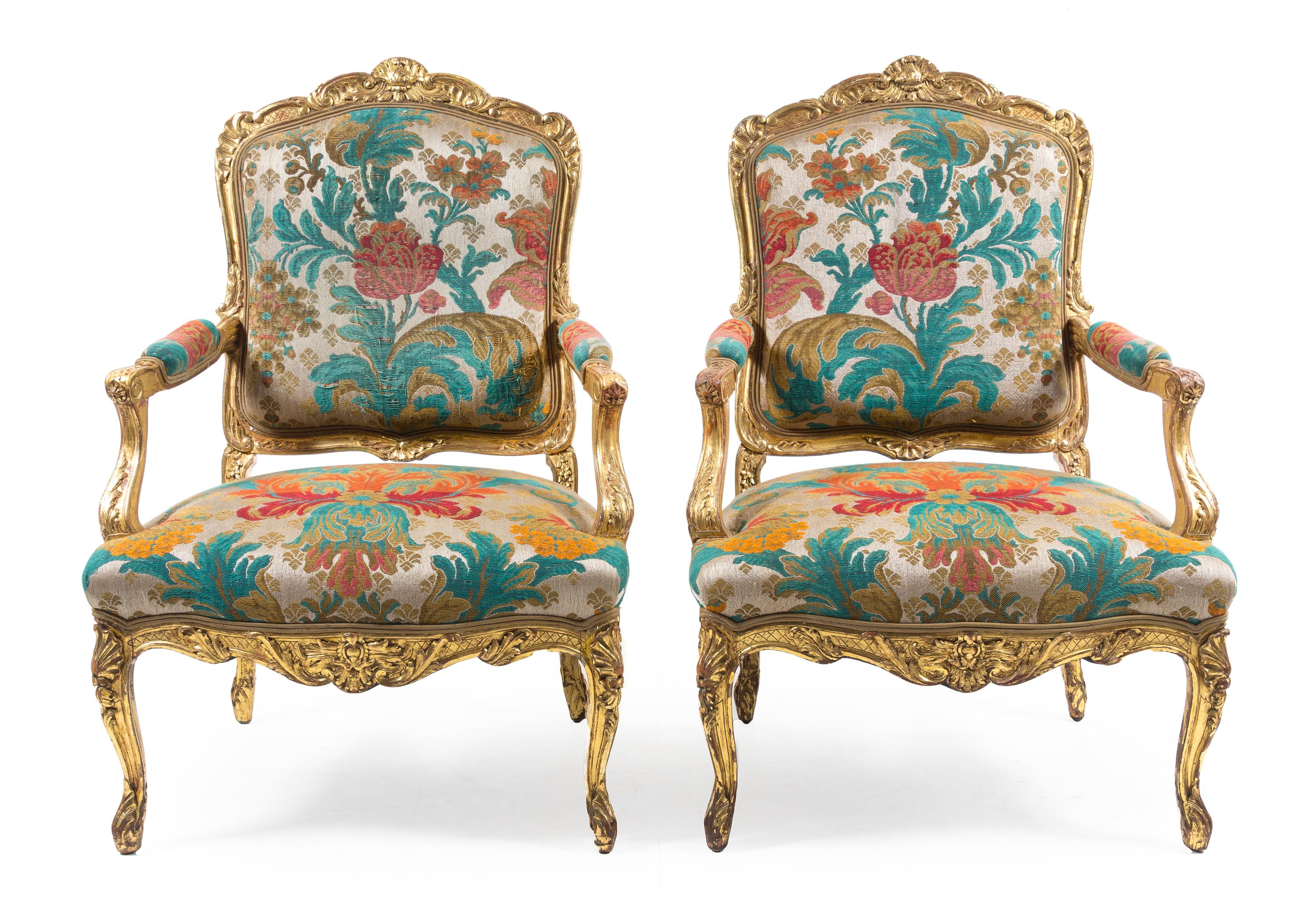 A Pair of Louis XV Style Giltwood Fauteuils — 19TH CENTURY