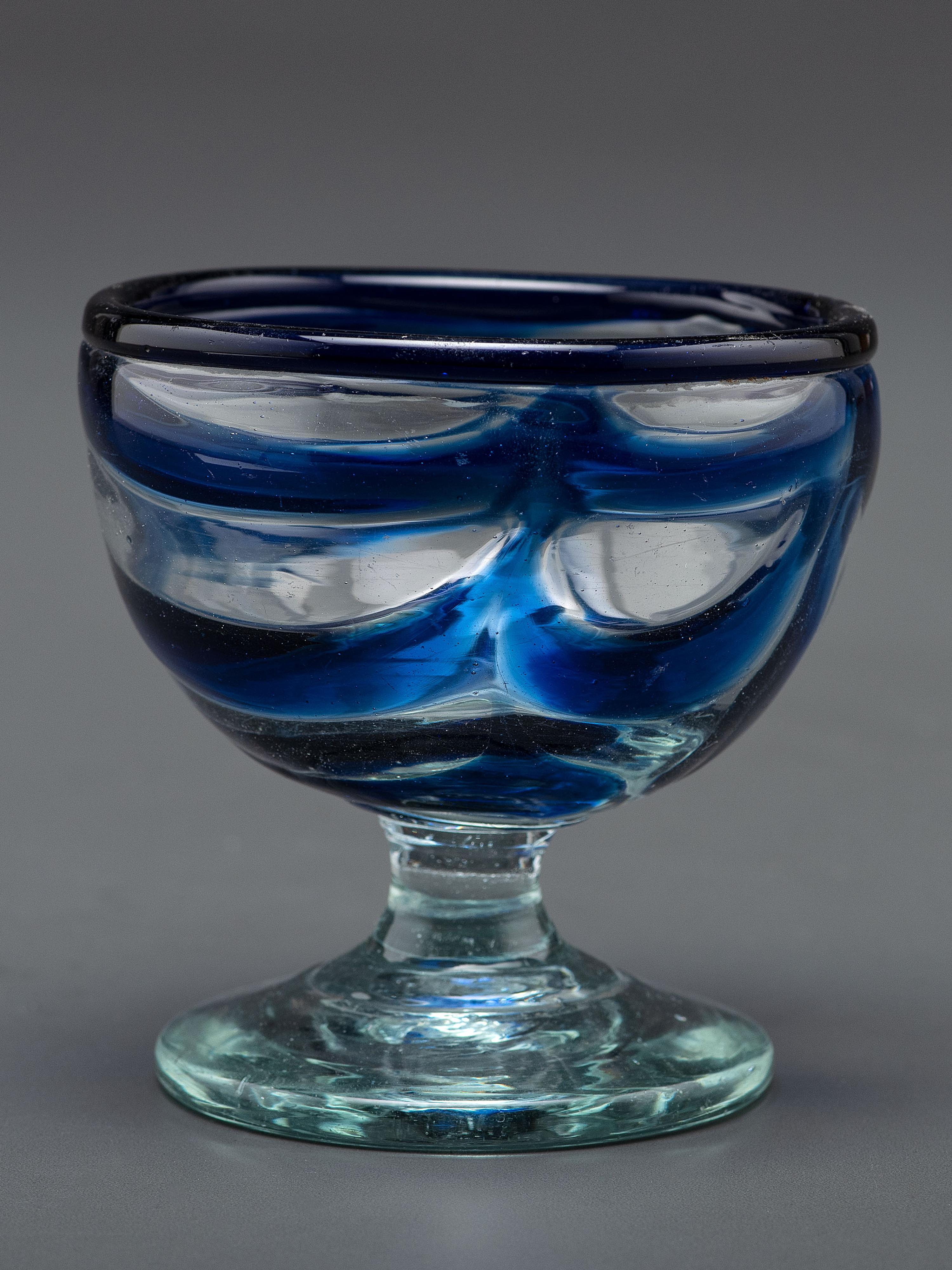A South Jersey-Type Footed Eating Bowl in Clear and Cobalt Blue
