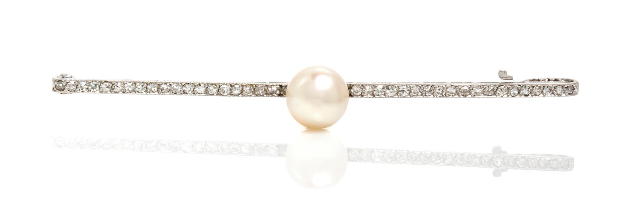 A Platinum, Diamond and Cultured Pearl Bar Pin, 4.05 dwts.