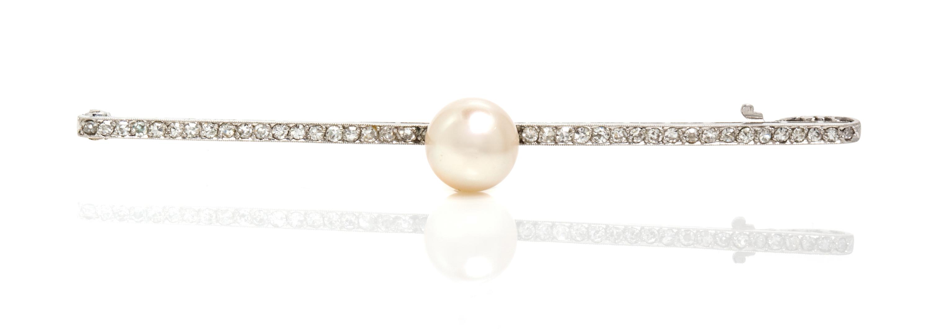 A Platinum, Diamond and Cultured Pearl Bar Pin, 4.05 dwts.