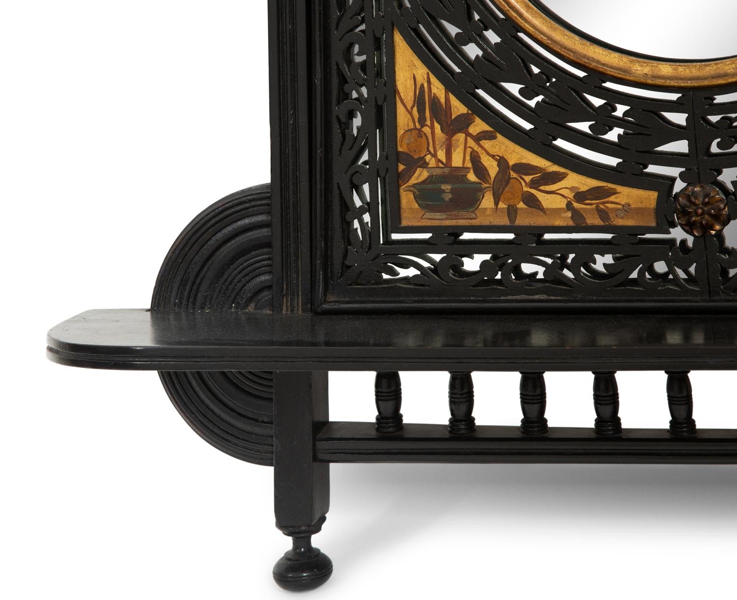 A Pair of Victorian Aesthetic Movement Ebonized, Painted and Parcel Gilt Mirrored Wall Brackets