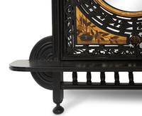 A Pair of Victorian Aesthetic Movement Ebonized, Painted and Parcel Gilt Mirrored Wall Brackets