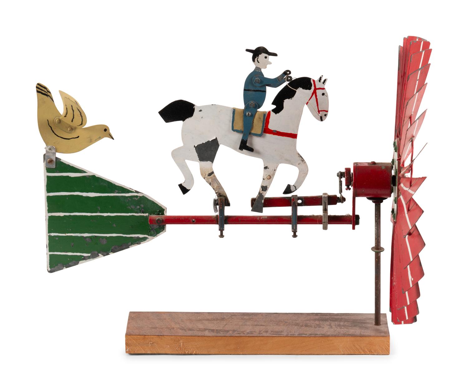 A Folk Art Painted Tin Whirligig of a Trotting Horse