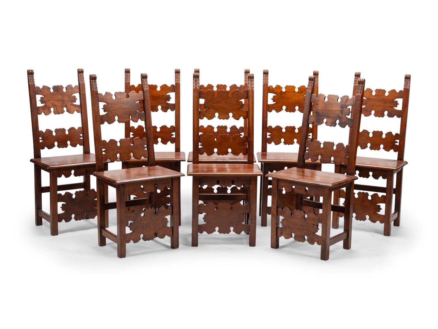 A Set of Eight Continental Baroque Style Walnut Chairs
