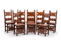 A Set of Eight Continental Baroque Style Walnut Chairs