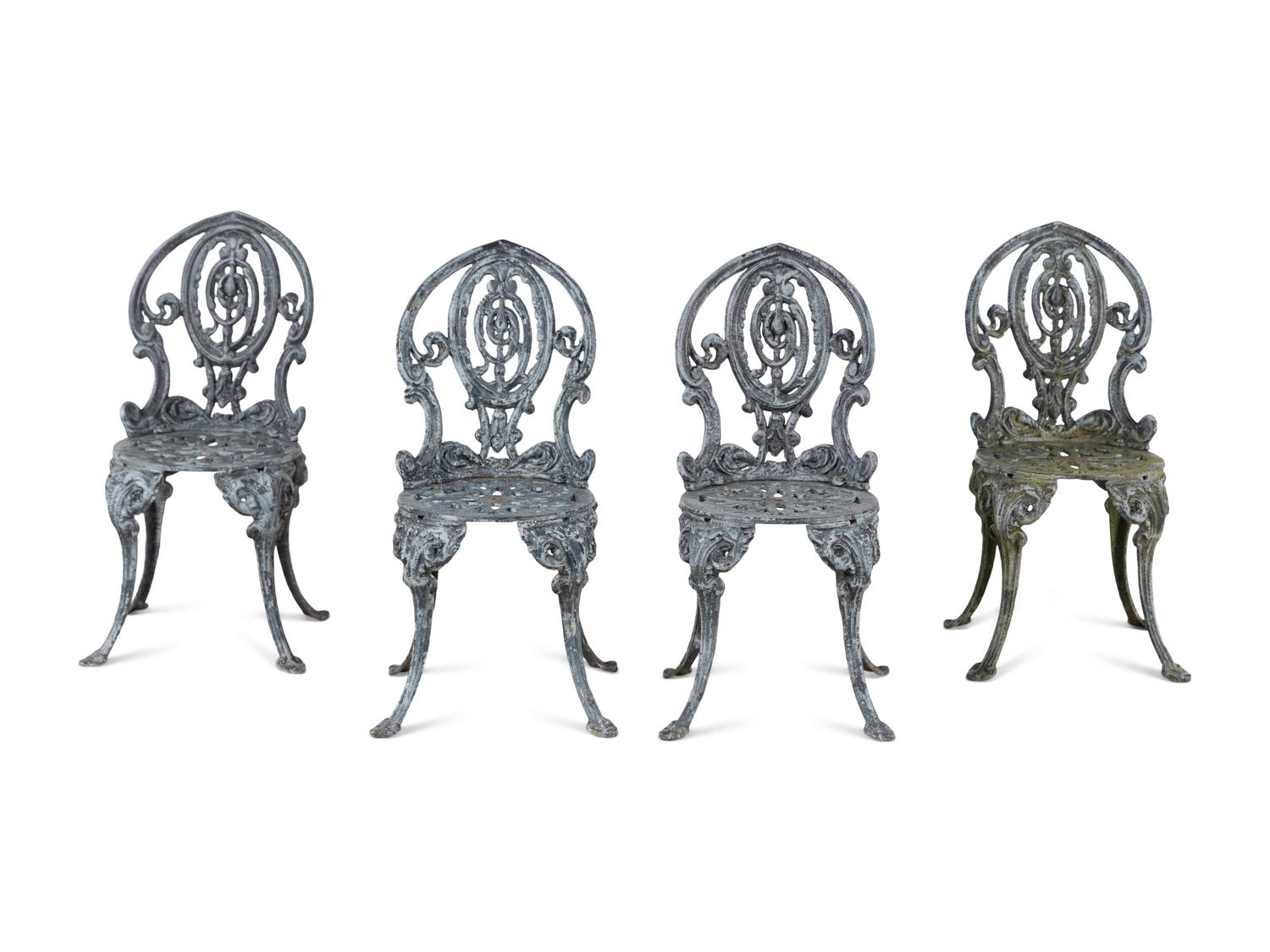 A Set of Four Wrought Iron Chairs