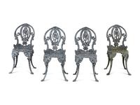 A Set of Four Wrought Iron Chairs