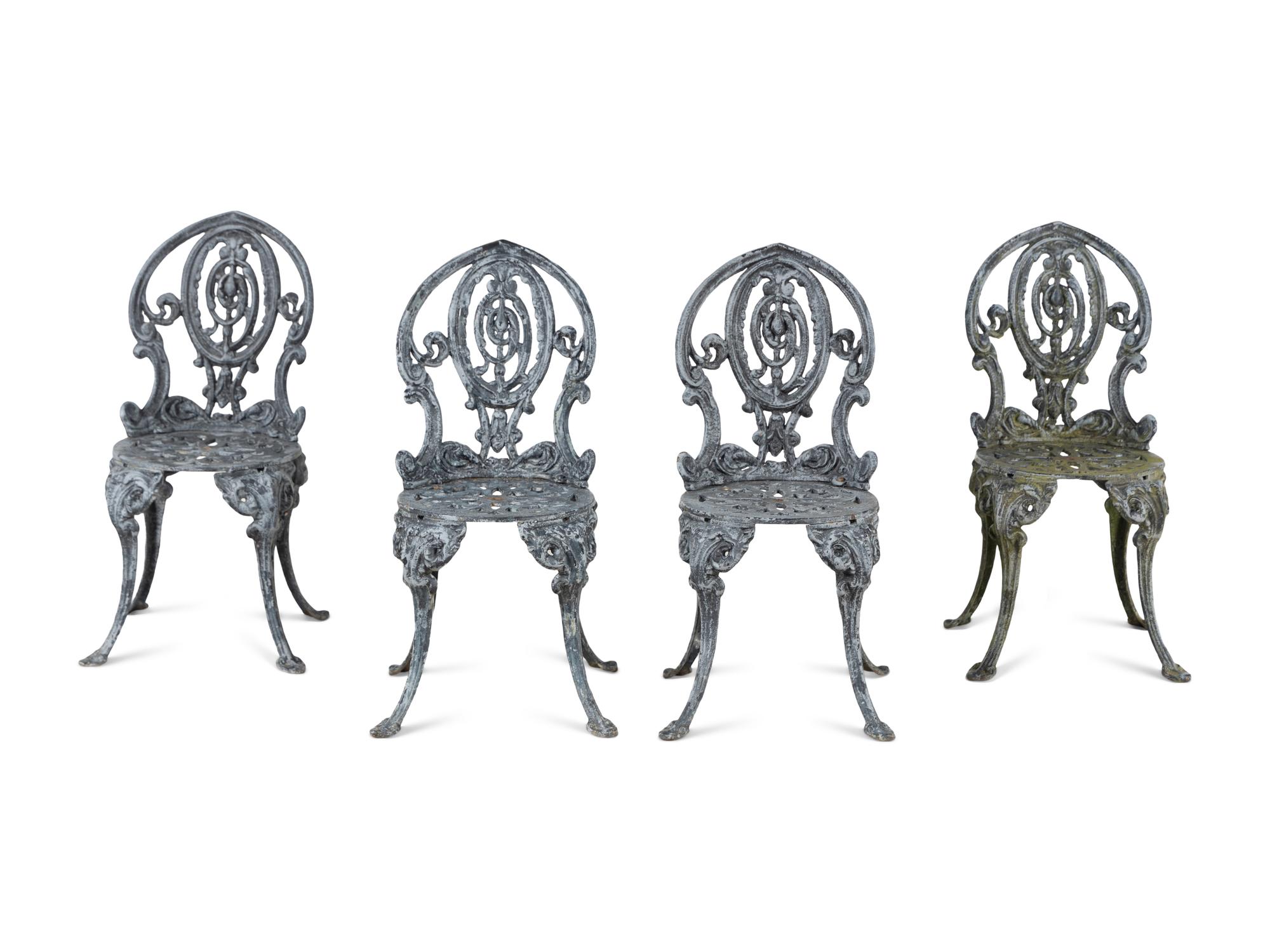 A Set of Four Wrought Iron Chairs