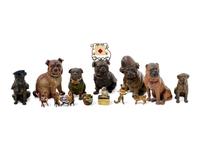 A Collection of Painted Bronze and Ceramic Models of Pugs