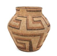 A Tohono O'odham Storage Basket Height 19 inches.