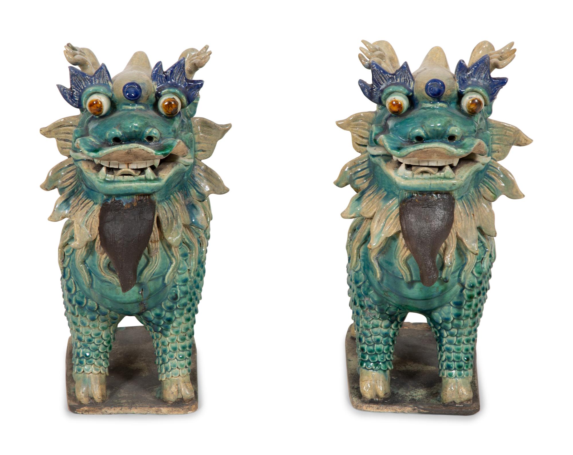 A Pair of Chinese Glazed Ceramic Dragons